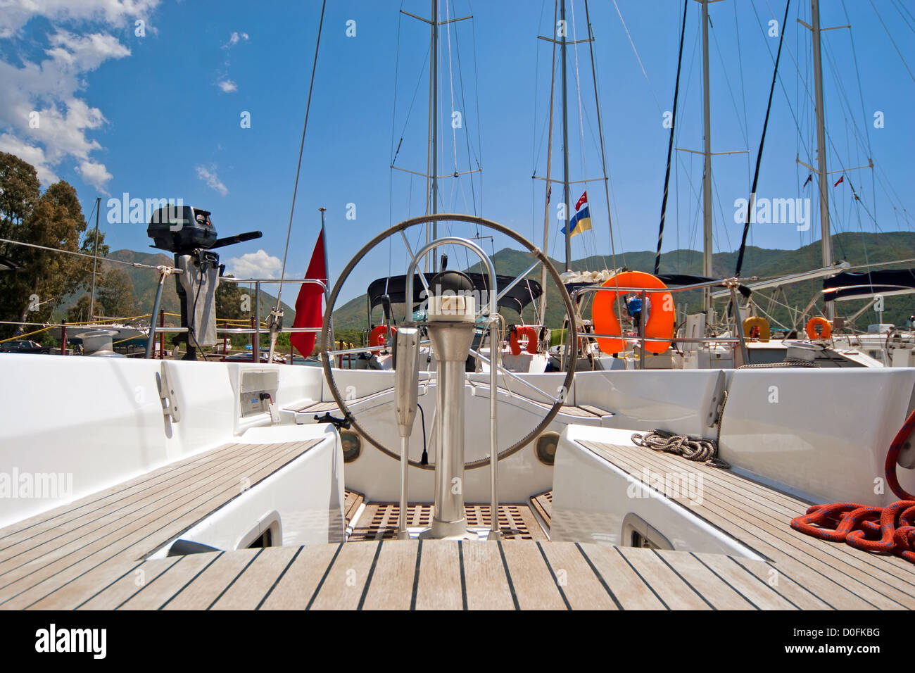 Steer and compass on sailing boat Stock Photo Alamy