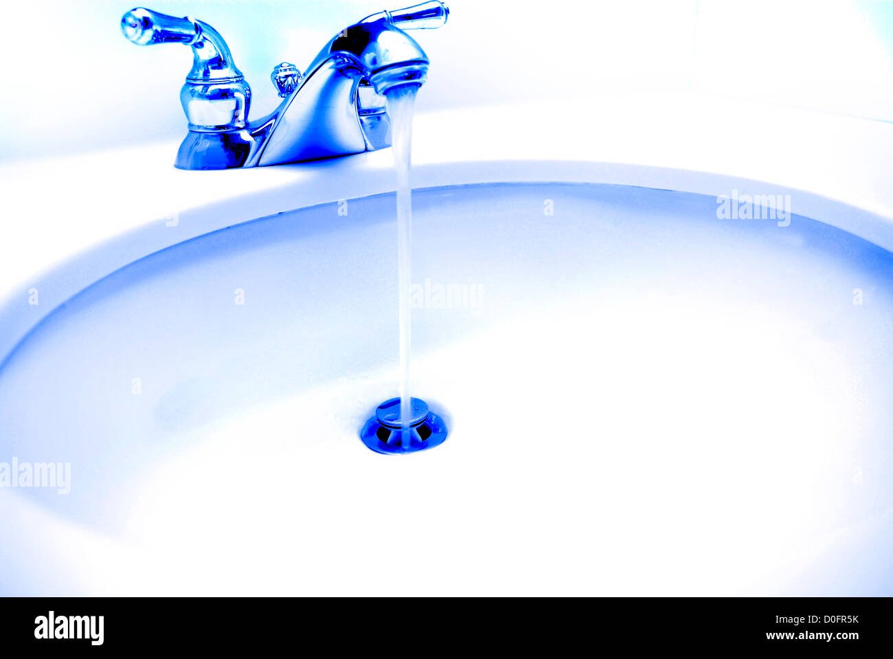 Sink with faucet and water running Stock Photo Alamy