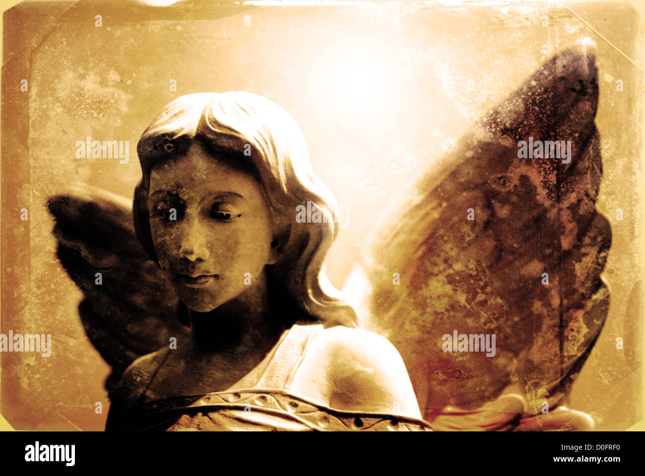 Angel statue with wings representing purity and heavenly strength Stock