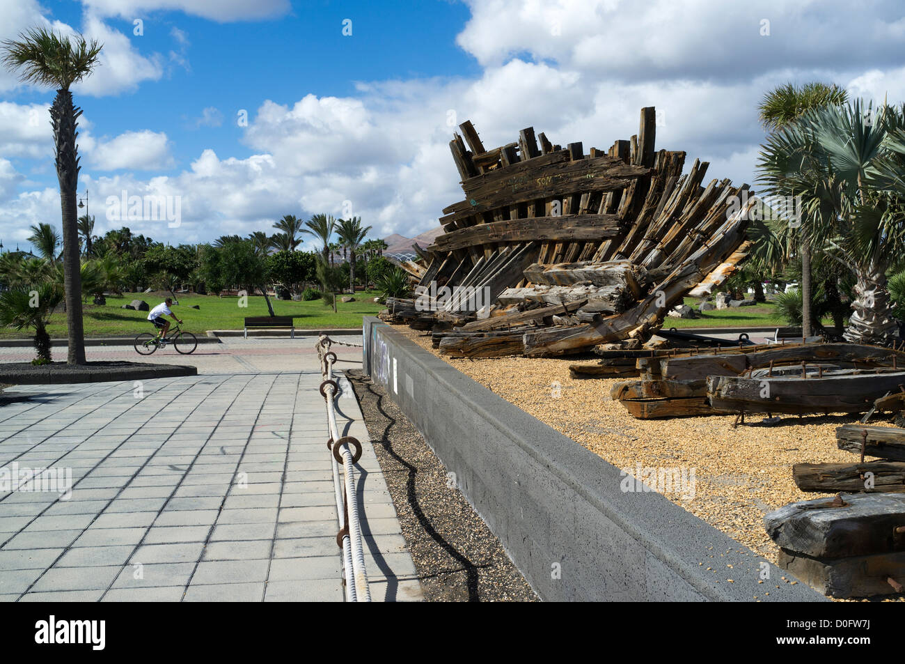 dh  ARRECIFE LANZAROTE Wooden artwork outdoors art cyclist riding park garden outdoor modern sculpture outside Stock Photo