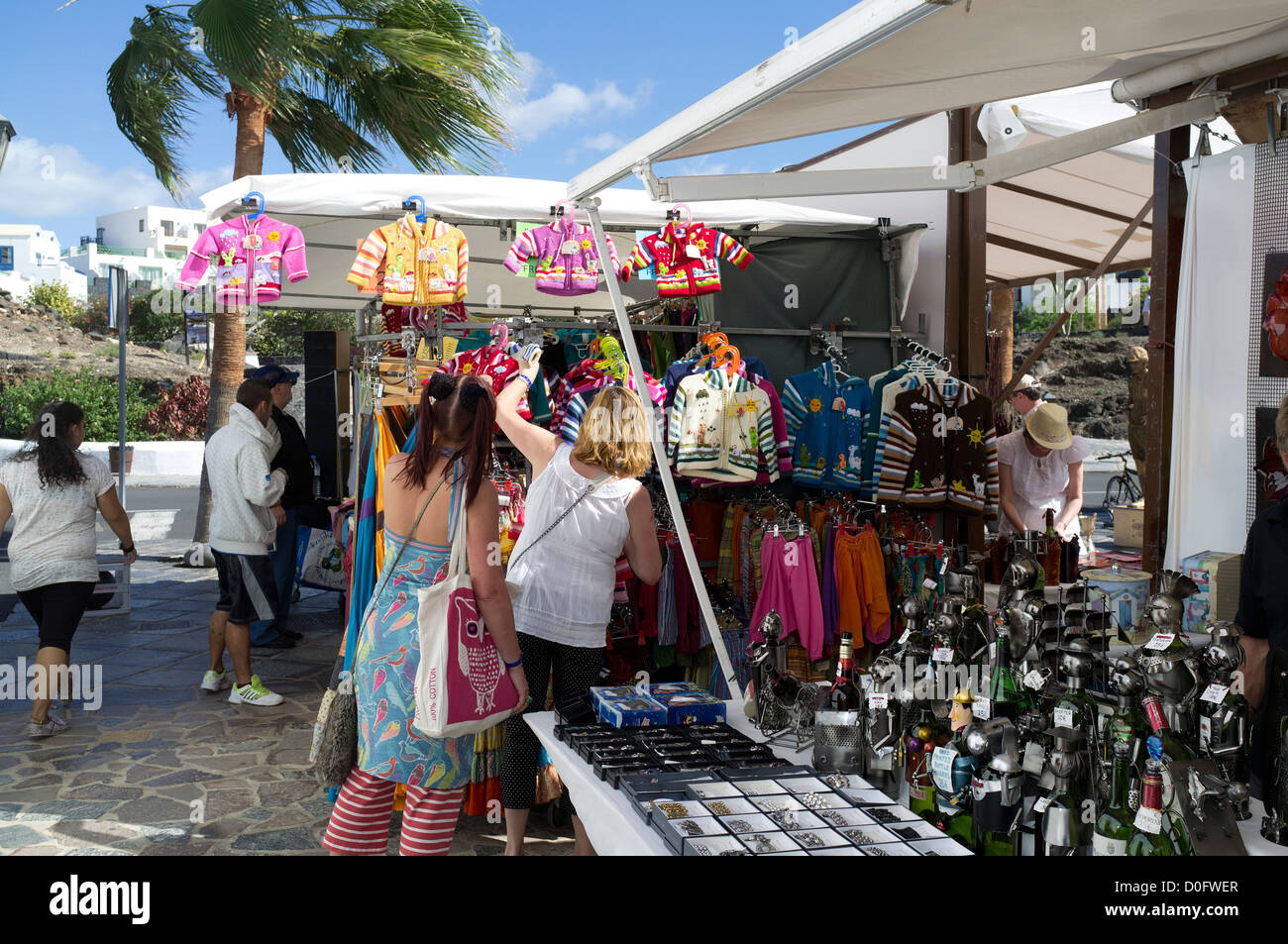 dh Marina Rubicon PLAYA BLANCA LANZAROTE Women tourists shopping Stock