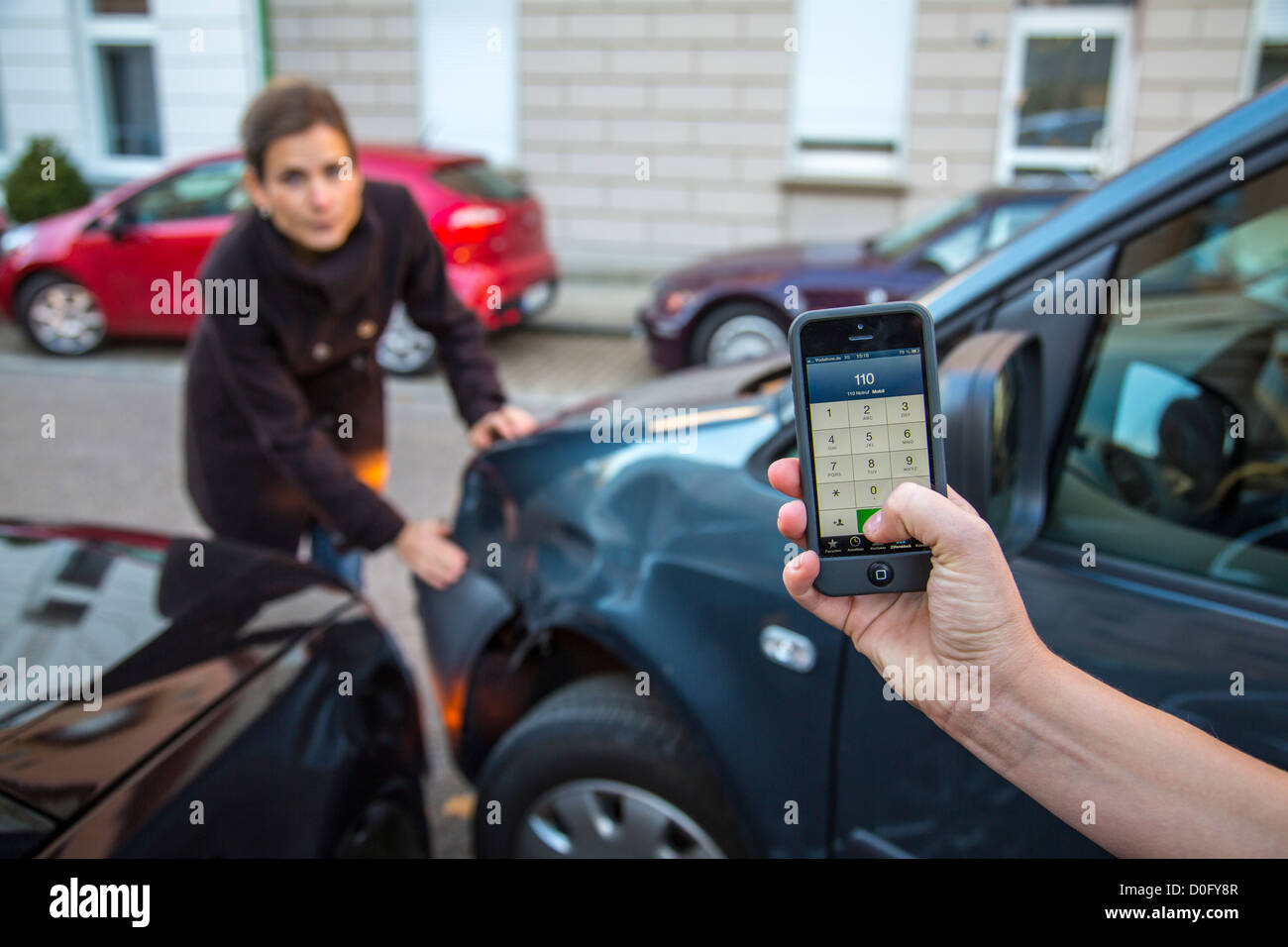 Car accident with minor damage. To woman discus the reason of the car ...