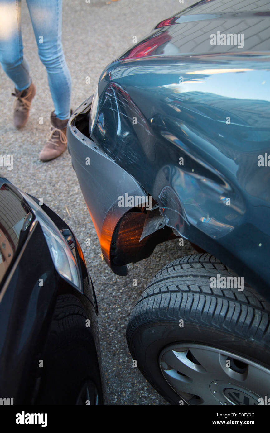 Car accident with minor damage. To woman discus the reason of the car ...