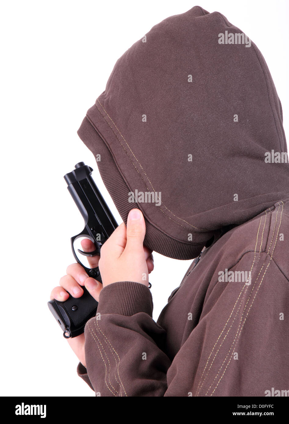 teenager in the hood with gun, isolated on white Stock Photo