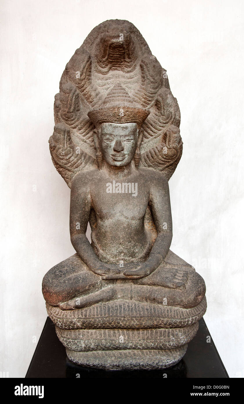 Buddha Image under Naga Khmer art Angor wat style 12th century AD Lopburi Stock Photo