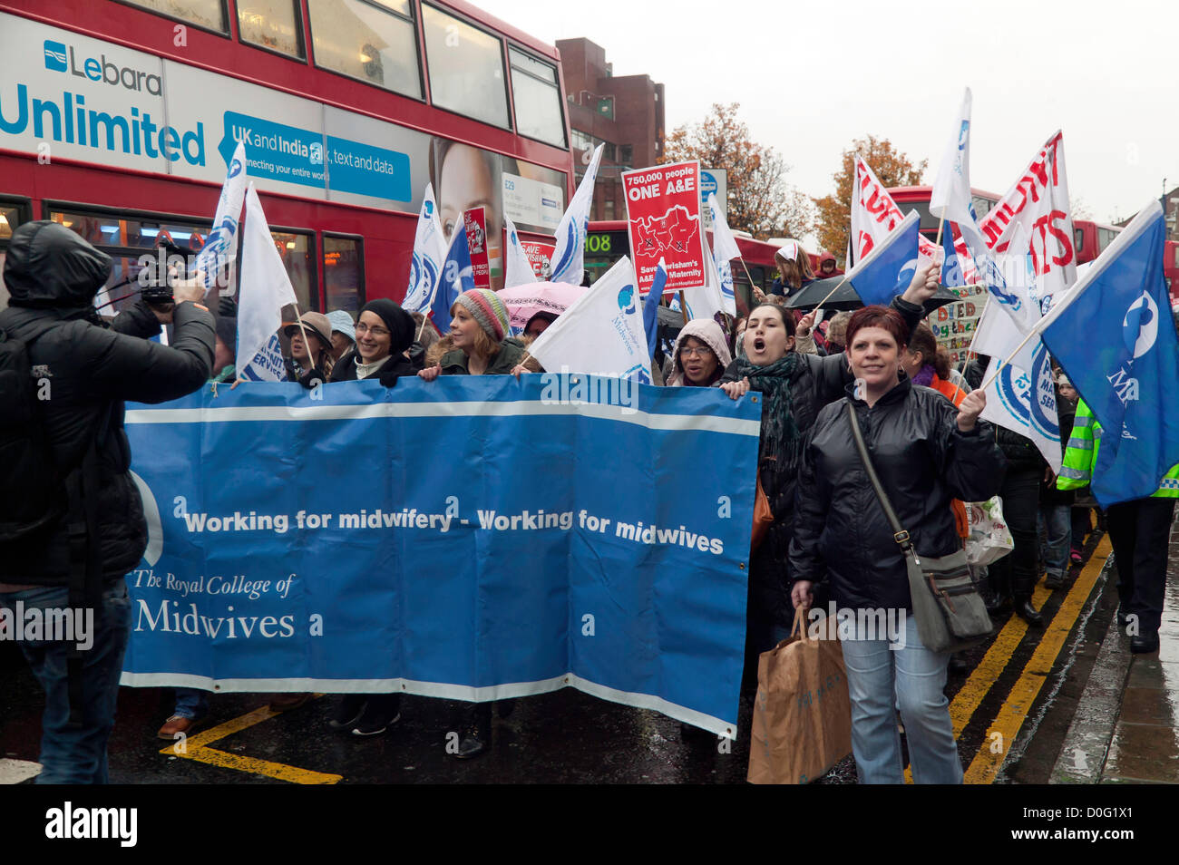 Lewisham Midwives protest against the proposed cuts to Lewisham NHS services as part of  a very large march held on 24.11.12 in Lewisham High Street. Stock Photo