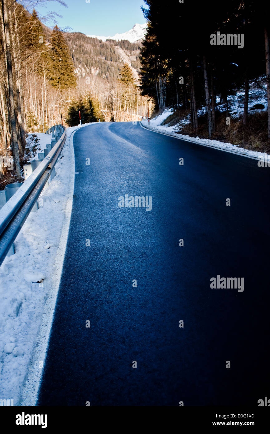A mountain road winds past golden aspen trees Stock Photo - Alamy