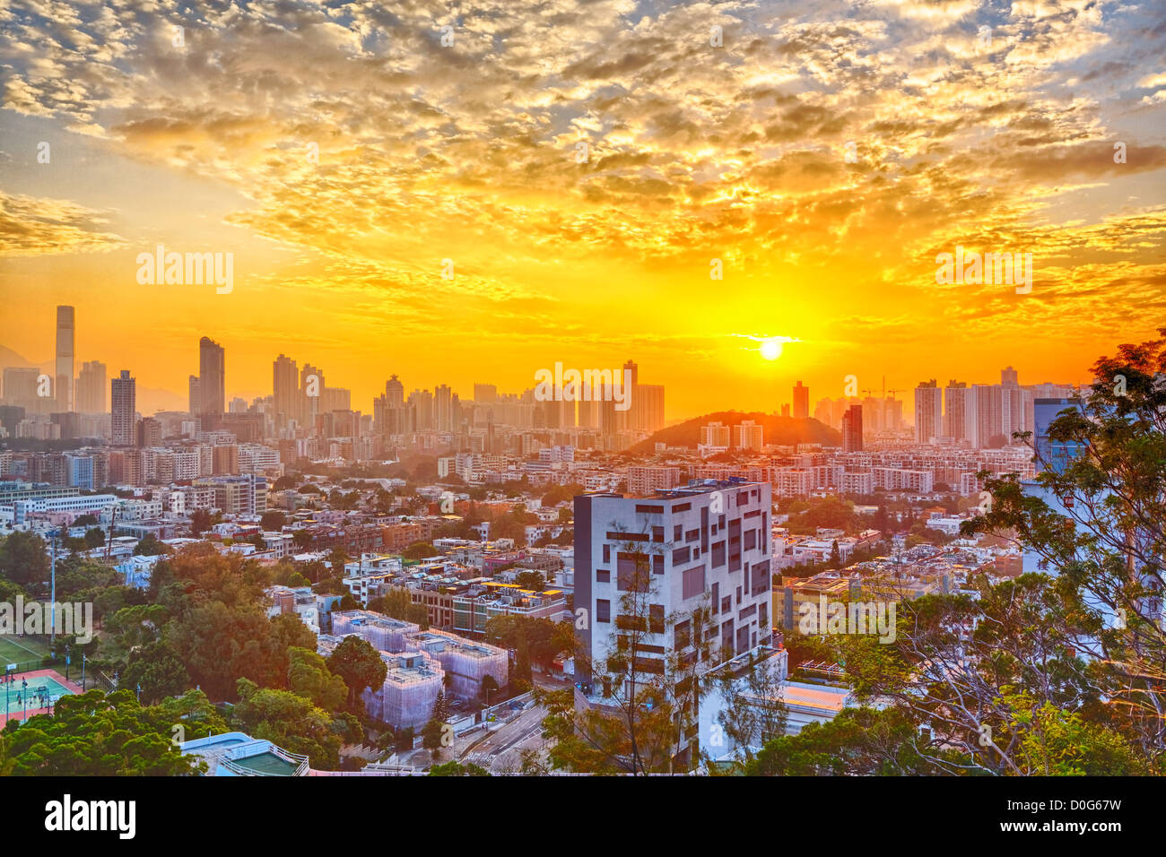 Hong Kong modern city at sunset Stock Photo - Alamy