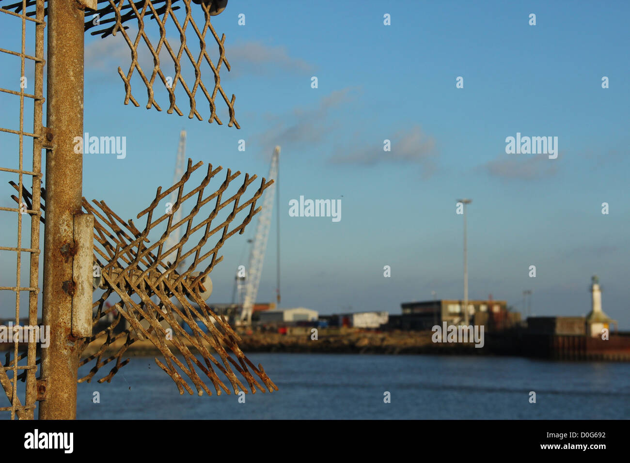 Metal mesh security fencing at Lowestoft port, Suffolk, UK Stock Photo