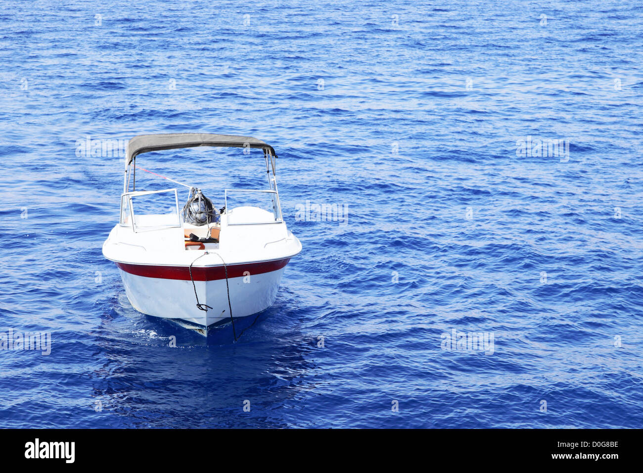 White motor boat with awning at the sea Stock Photo - Alamy