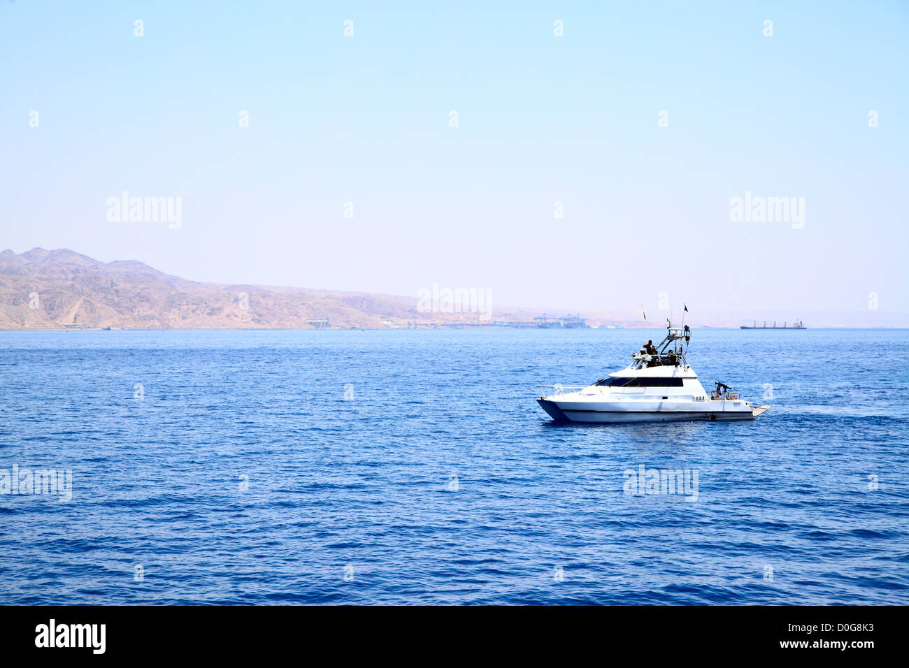 White motorized yacht at the sea Stock Photo - Alamy