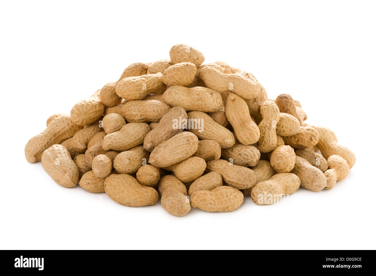 a heap of peanuts or monkey nuts isolated on a white background Stock Photo