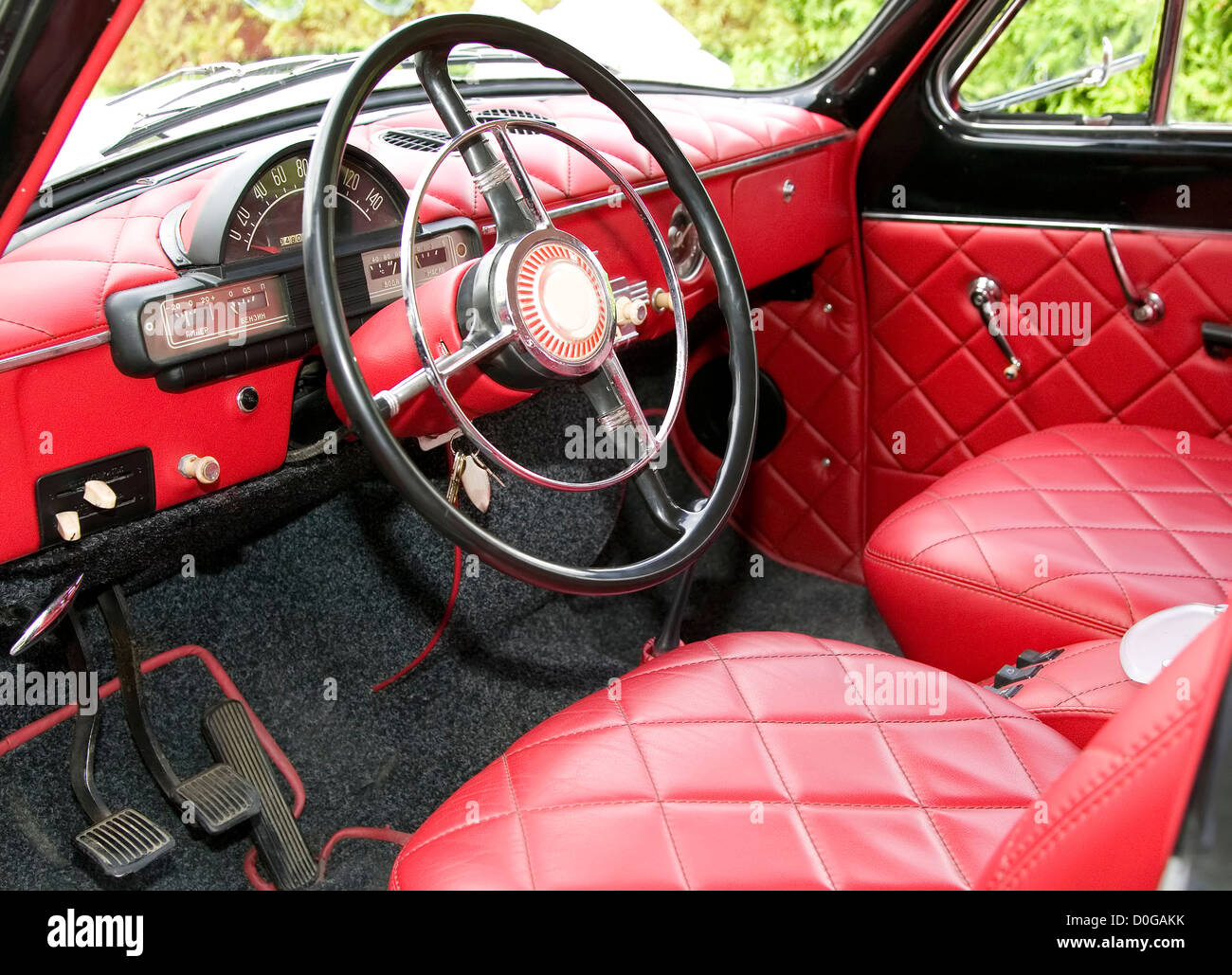 Antique car with red interior inside and old black wheel Stock Photo ...