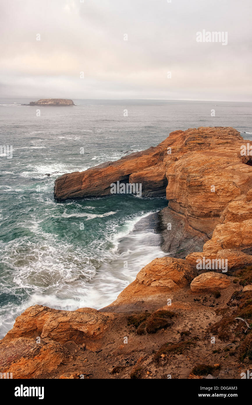 Fog lifts revealing sandstone cliffs hi-res stock photography and ...