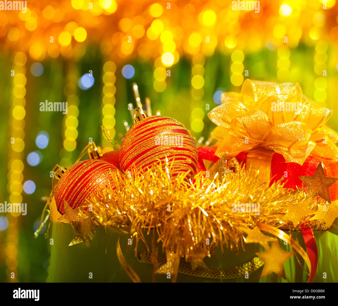 Photo of festive Christmas ornament, bright glowing garland, green