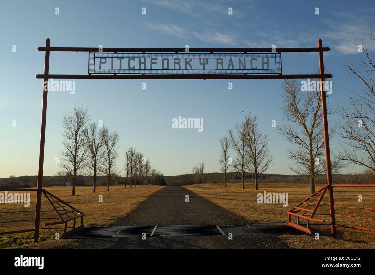 Main entrance gate to the Pitchfork Land and Cattle Company ranch near Guthrie Texas Stock Photo