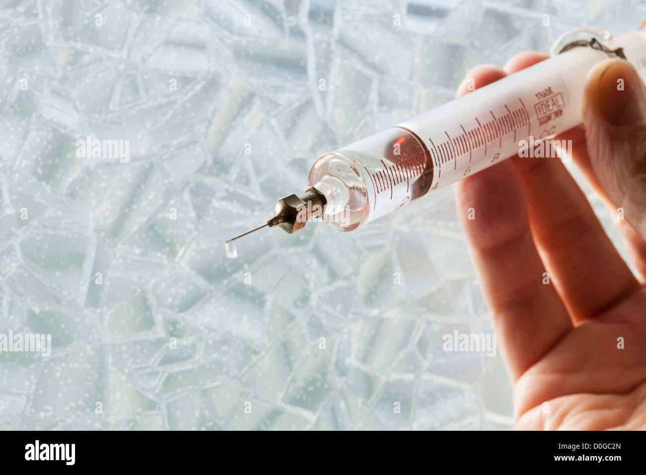 Antique Glass and Steel Syringe Close Up Stock Photo
