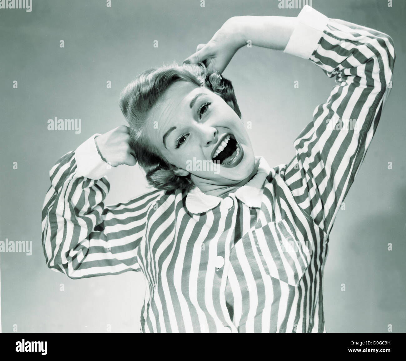 Black and white print of woman yawning Stock Photo