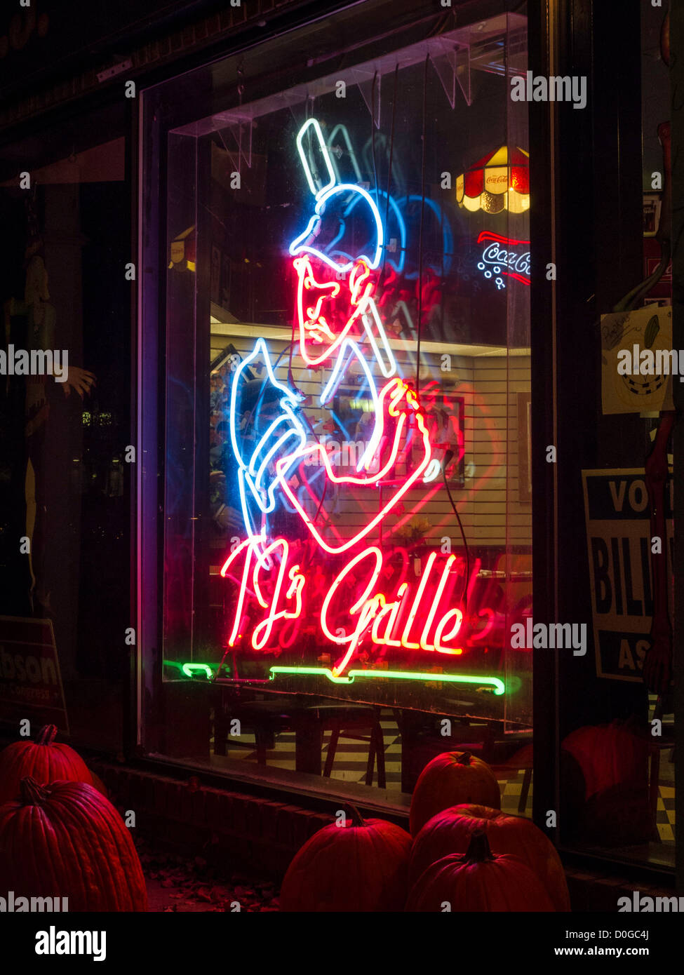Baseball Batter Neon, TJ's Grill Window at Night, Main Street, Cooperstown, New York, USA Stock Photo