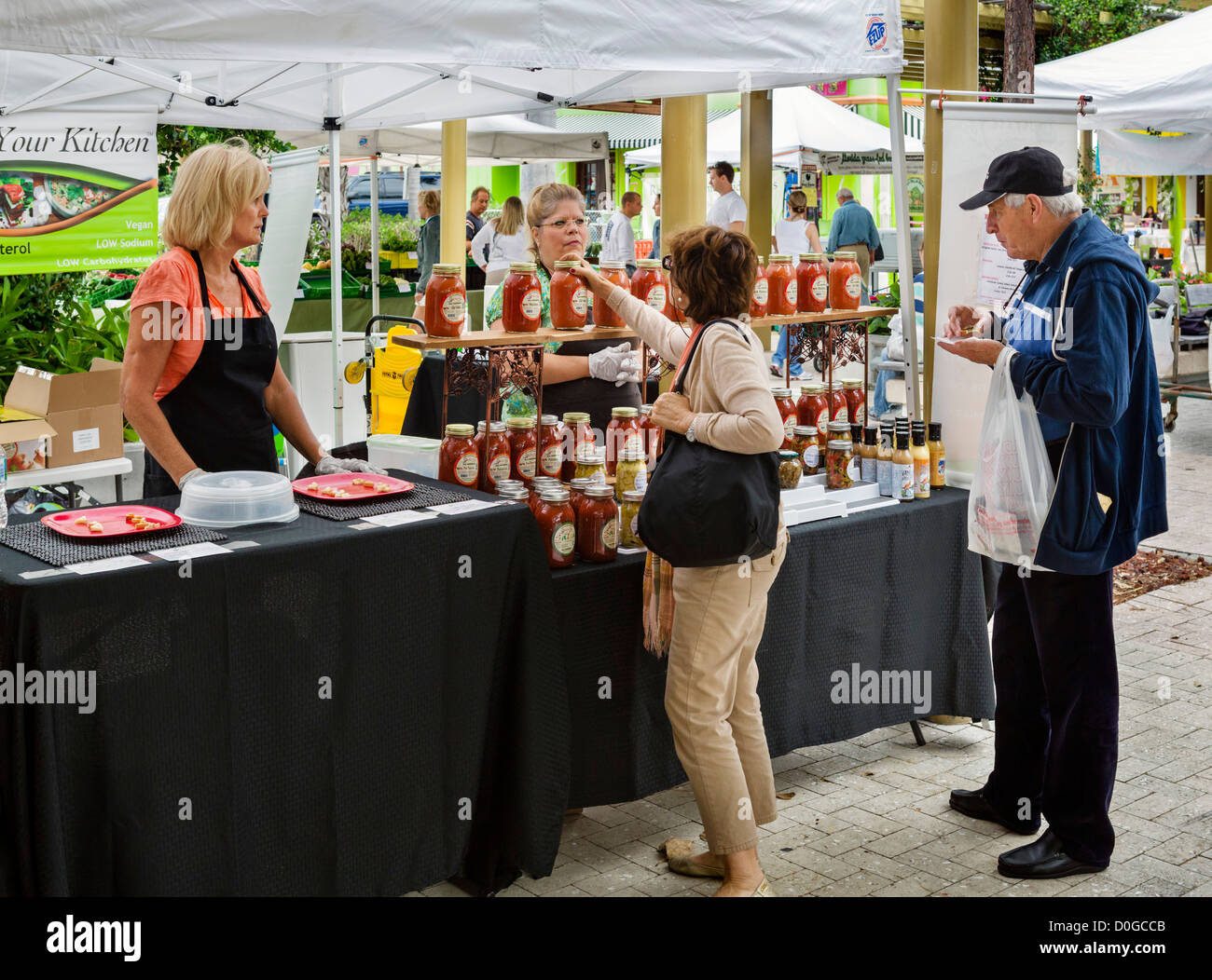 Stall selling spaghetti sauces at the saturday morning Greenmarket at the end of Clematis Street, West Palm Beach, Florida, USA Stock Photo