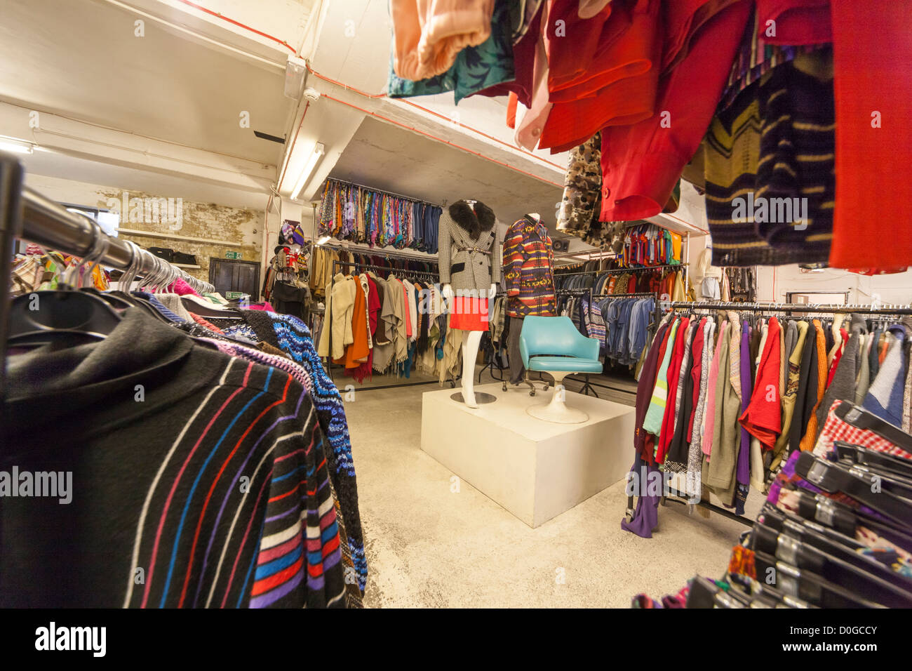 London The East End Thrift Store. Interior of trendy vintage clothes shop. Great for shopping on a budget for cheap bargains. Stock Photo