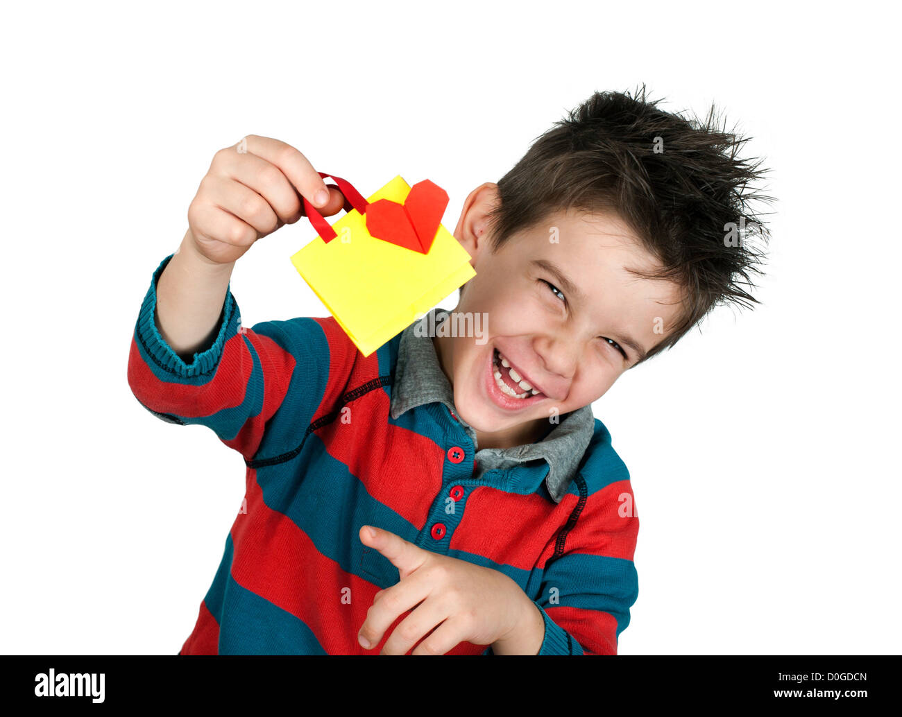Boy who laughs and holds small shopping bag with heart. White copy spice Stock Photo