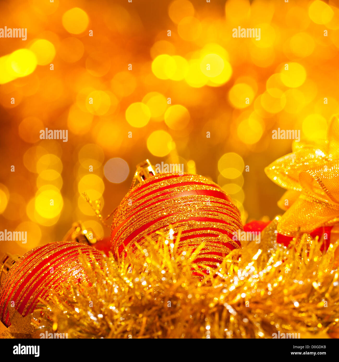 Picture of New Year decorative still life on golden lights background ...