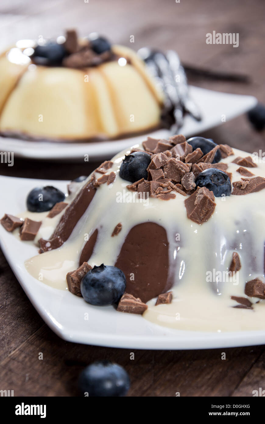 Pudding Picture Vanilla and Chocolate Pudding on wooden background Stock Photo - Alamy