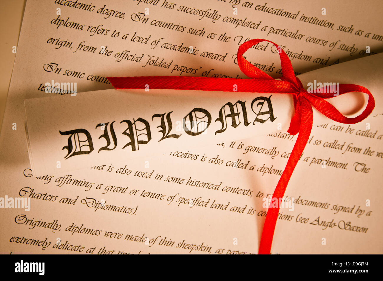 Diploma With Red Ribbon Stock Photo - Alamy