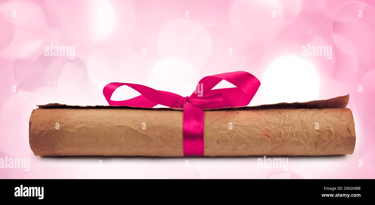 Diploma with red ribbon with lights in the background Stock Photo - Alamy