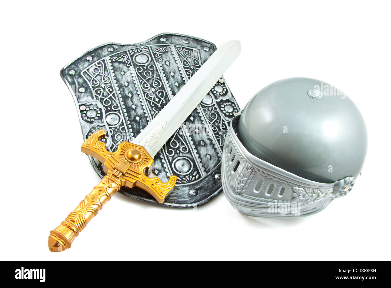 Old shield with sword and helmet isolated over white Stock Photo