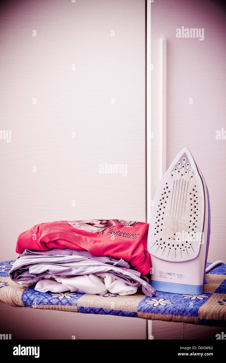 laundry, iron and ironing board Stock Photo Alamy