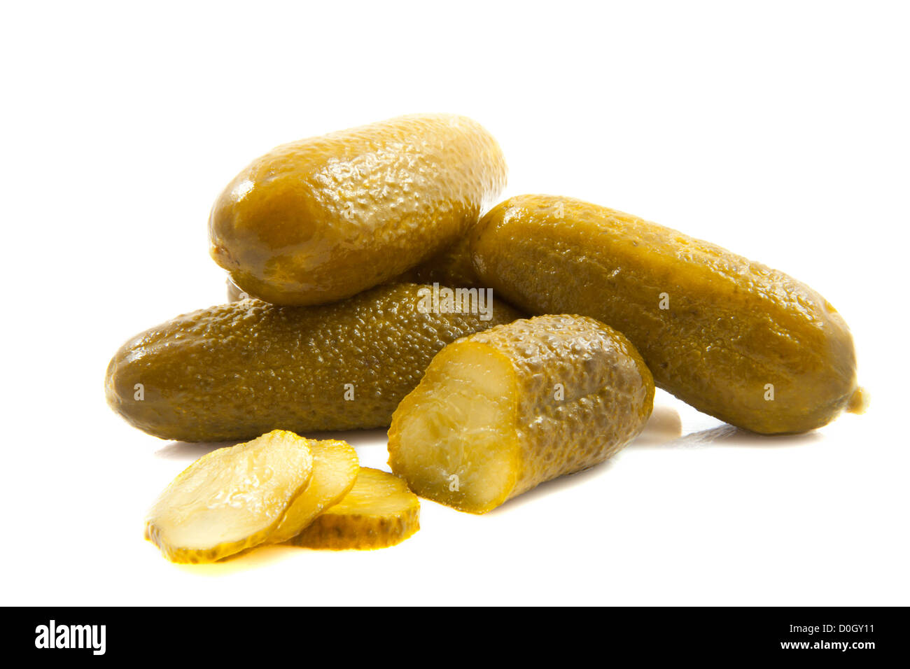 Fresh sliced green pickles isolated over white Stock Photo