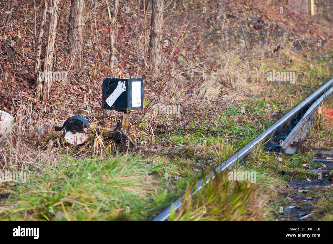 old railway crossover in the grass Stock Photo