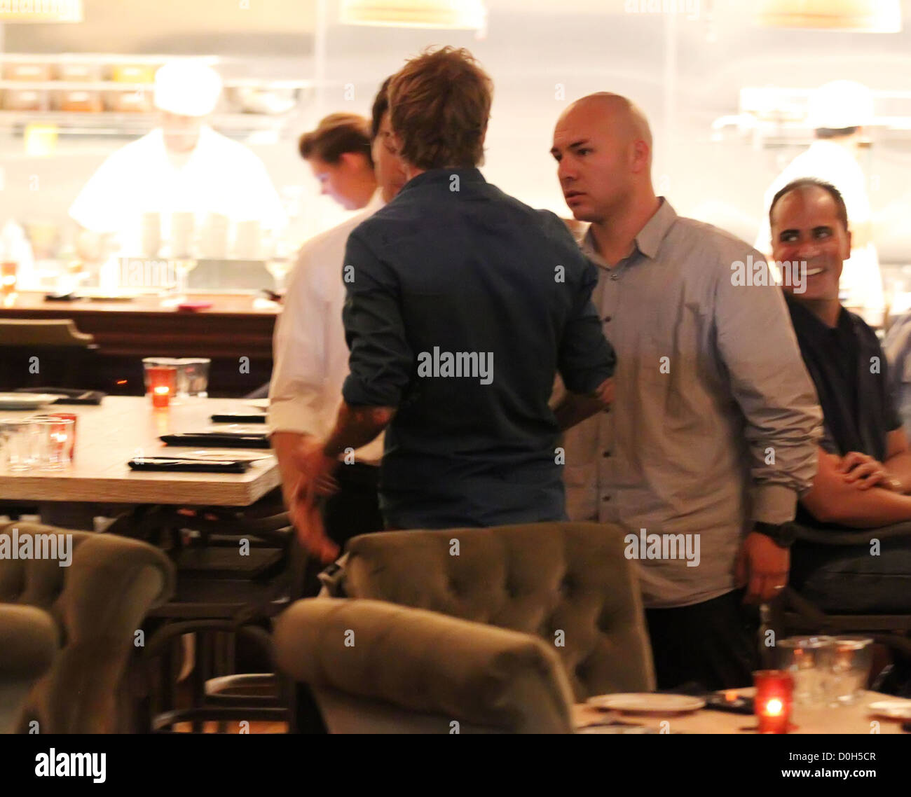 David Beckham chats to the Cleo restaurant staff, after having dinner with Iranian-American entrepreneur Sam Nazarian and his Stock Photo