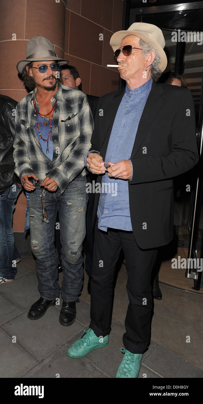 Johnny Depp And Keith Richards Both Wearing Fedora Hats And Stock