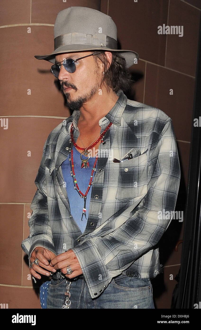 Depp wearing hat sunglasses leaving hi res stock photography and images Alamy