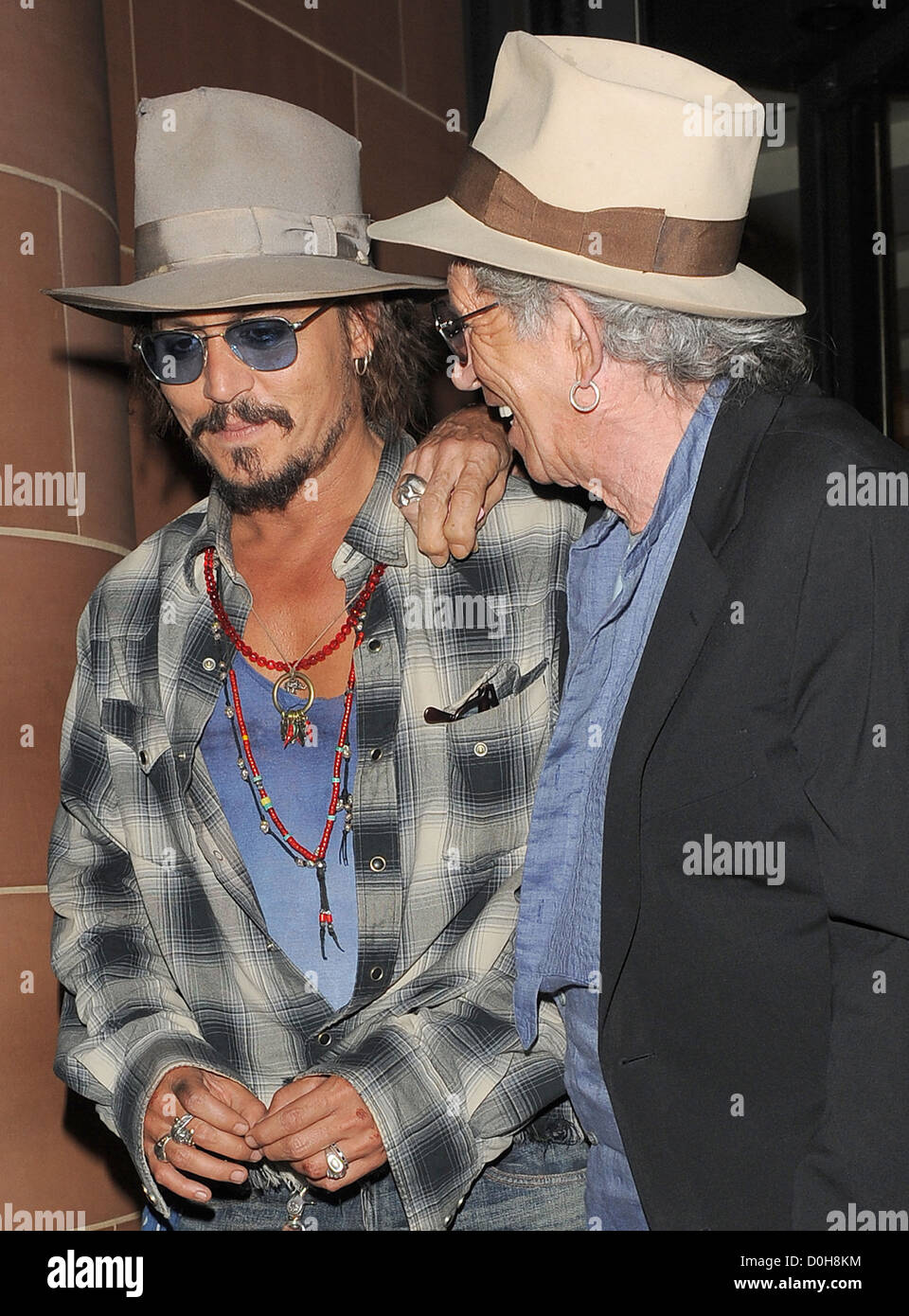 Johnny Depp and Keith Richards both wearing fedora hats and sunglasses  leaving 'C London' restaurant. Depp was sporting some Stock Photo - Alamy