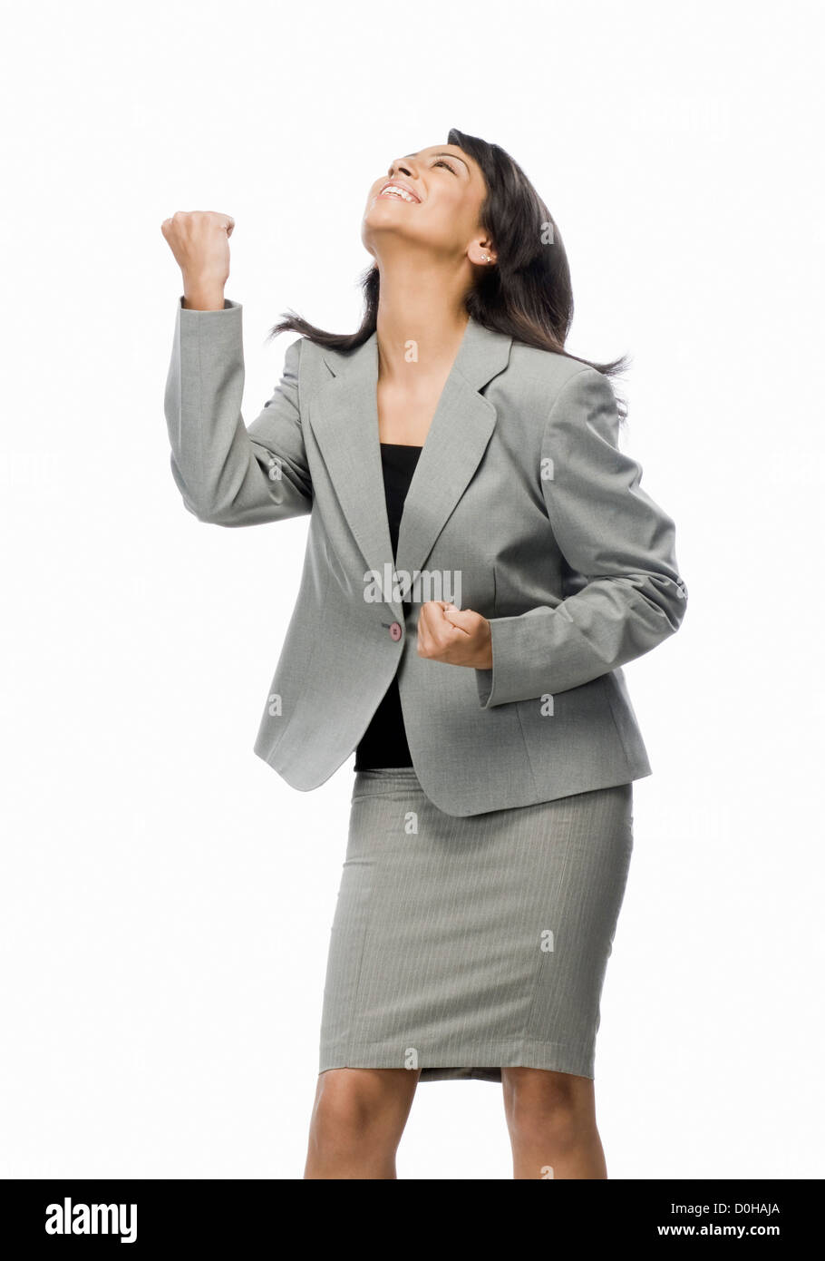 Businesswoman clenching her fist with joy Stock Photo Alamy