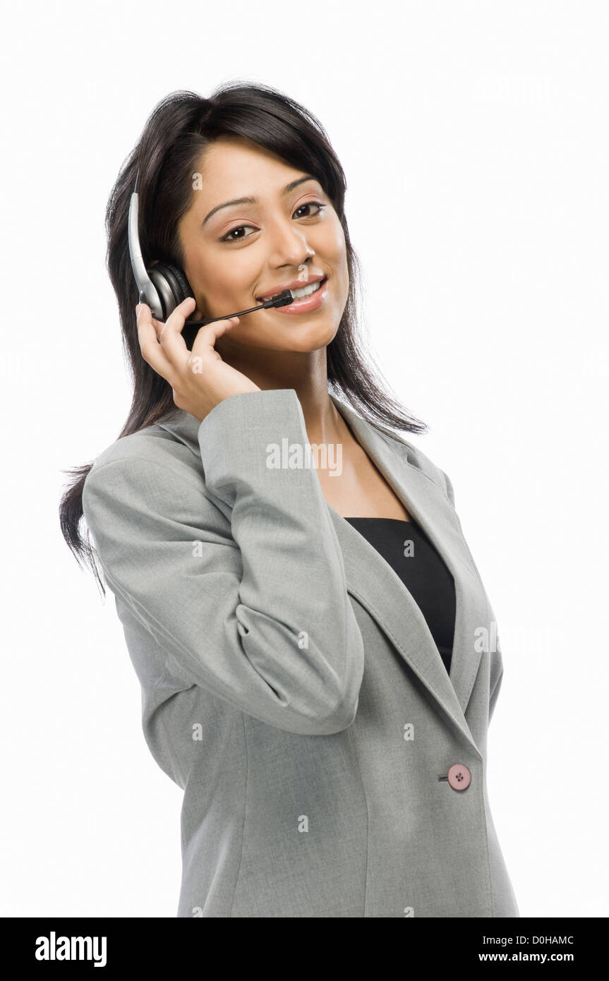Portrait of a female customer service representative smiling Stock ...