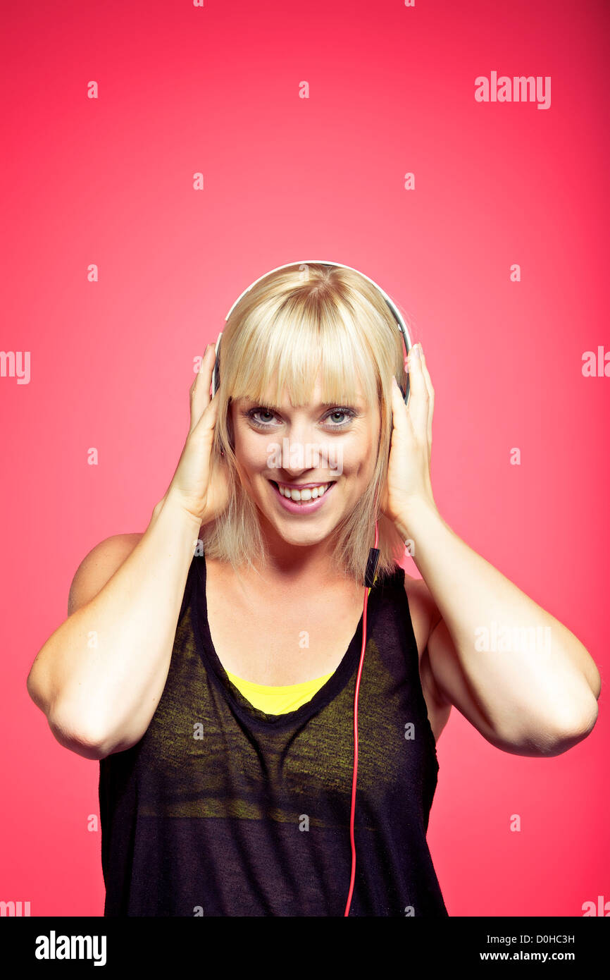 Stylish teen in a studio having fun while listening to the beat of