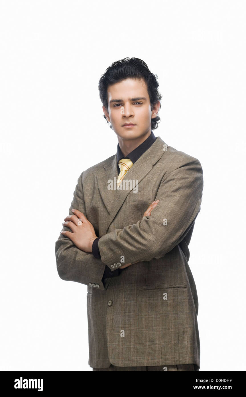 Portrait of a businessman with his arms crossed Stock Photo - Alamy