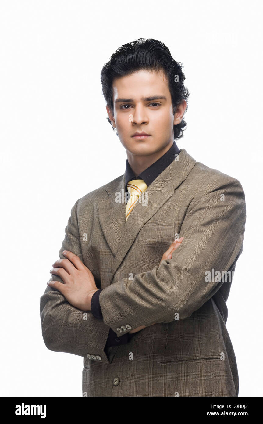 Portrait of a businessman with his arms crossed Stock Photo - Alamy