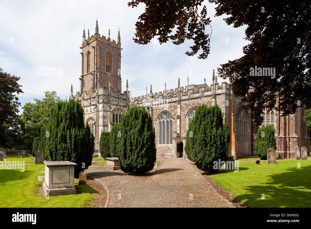 Tiverton, UK - August 11, 2012: Saint Peter's Parish Church. Garden and graves. Stock Photo