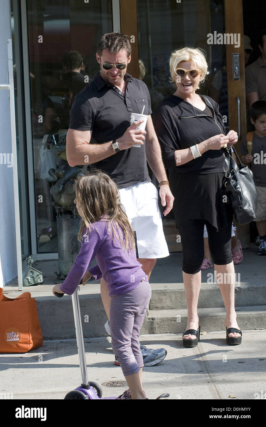 Hugh Jackman and Deborra-Lee Furness walking home with their daughter Ava after collecting her from school New York City, USA - Stock Photo