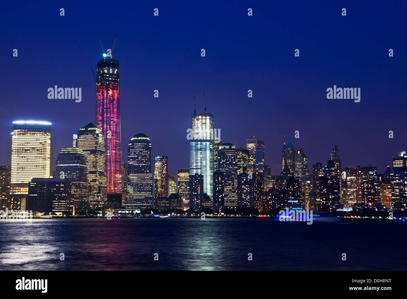 Downtown Manhattan skyline with Freedom tower by night, view from Jersey City New York City