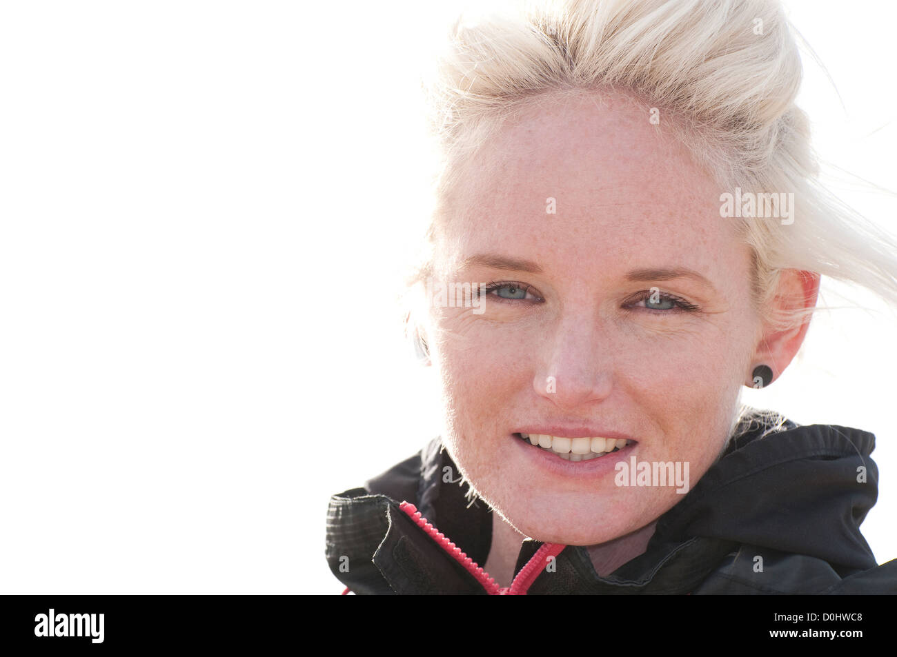 female jogger looking at camera Stock Photo