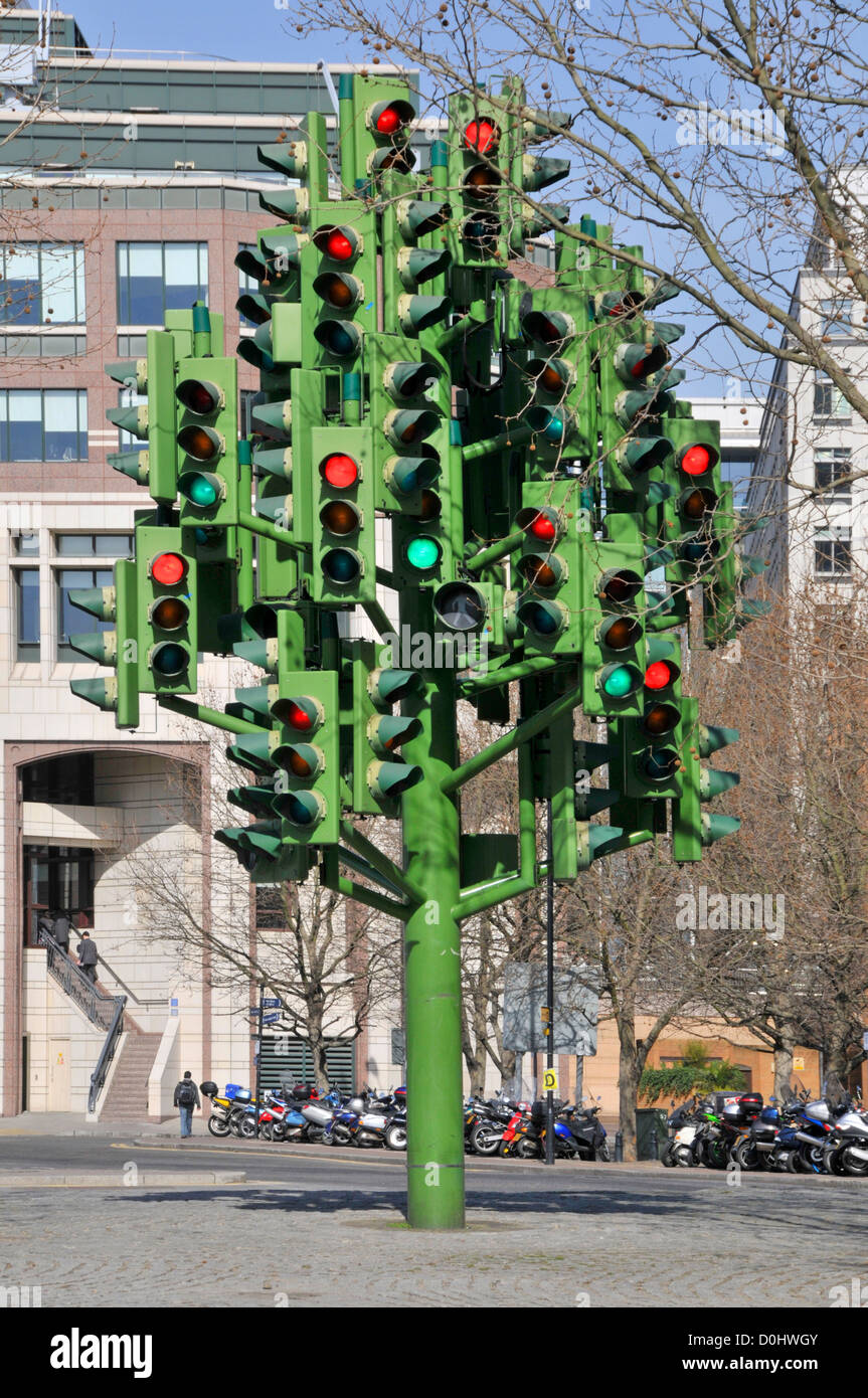 The Traffic Light tree sculpture by  French sculptor Pierre Vivant containing 75 sets of lights on a roundabout at Canary Wharf Stock Photo