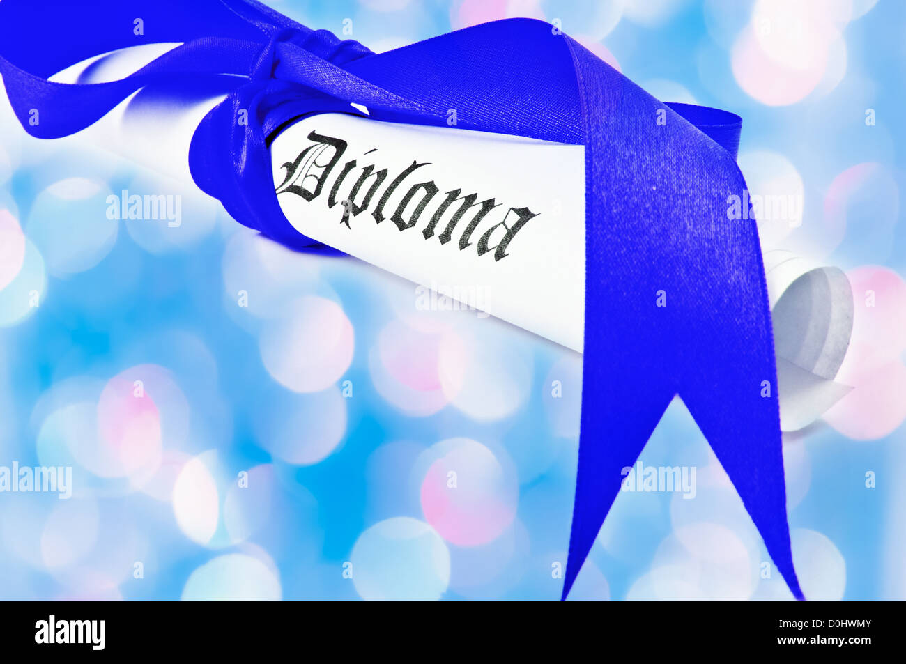 Diploma with blue ribbon with blue lights in the background Stock Photo ...