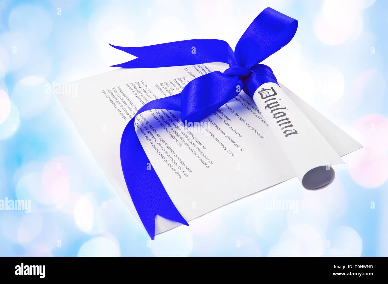 Diploma with blue ribbon with blue lights in the background Stock Photo ...